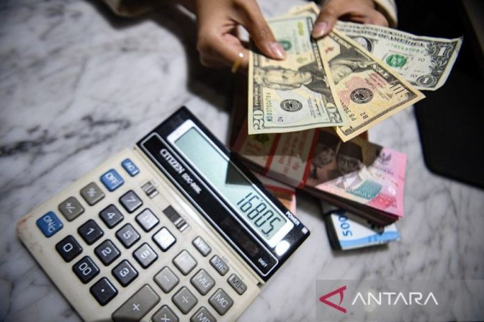 rupiah-ditutup-menguat-050-persen-2748087.jpg